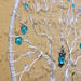 twin tree roots wrapped in aluminum wire 